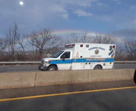 rainbow over ambulance